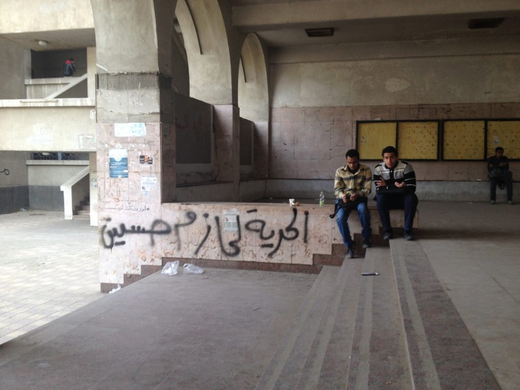 Political graffiti marks the wall of a building on the campus of Al-Azhar University in Cairo, in March, 2014.