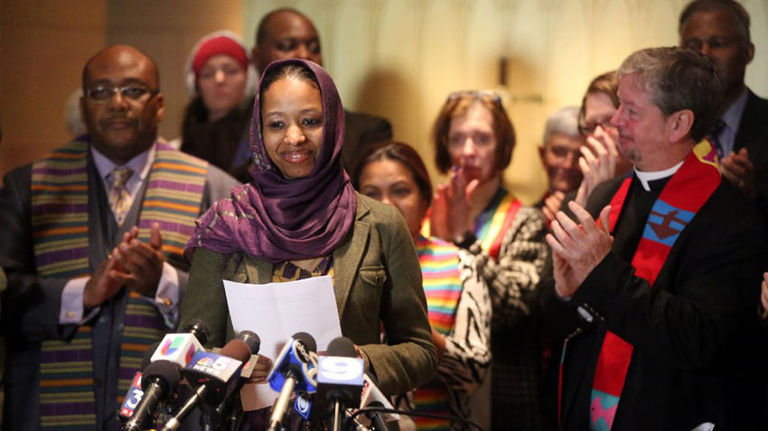 Wheaton College professor Larycia Hawkins is greeted with applause from supporters as she begins her remarks during a news conference on Dec. 16, 2015, in Chicago. (Brian Cassella / Chicago Tribune)